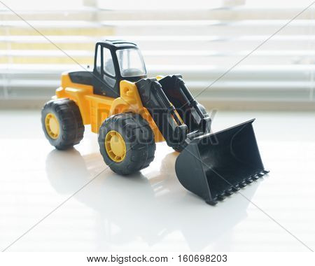 Toy Industrial Vehicle, Plastic Wheel Loader Excavator for Earth Moving Works at Construction Site, Miniature Earth Mover, Backhoe Loader, Frontend Loader with a Big Scoop, Heavy-duty Bulldozer