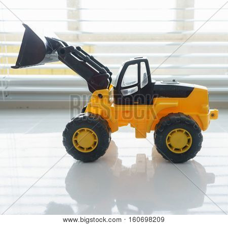Toy Industrial Vehicle, Plastic Wheel Loader Excavator for Earth Moving Works at Construction Site, Miniature Earth Mover, Backhoe Loader, Frontend Loader with a Big Scoop, Heavy-duty Bulldozer