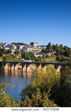 Roman bridge over the Minho River in Portomarin Spain