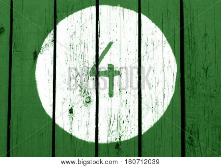 Number Four On Green Toned Wooden Wall.