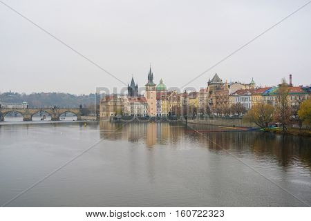 Panorama of an old Prague, bridges and embankment of Vitava river, Czechia