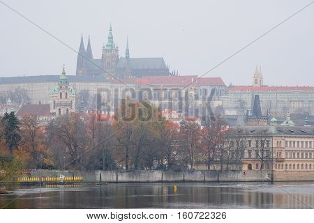 Panorama of an old Prague, bridges and embankment of Vitava river, Czechia