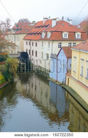 Panorama of an old Prague, bridges and embankment of Vitava river, Czechia