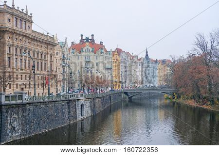 Panorama of an old Prague, bridges and embankment of Vitava river, Czechia