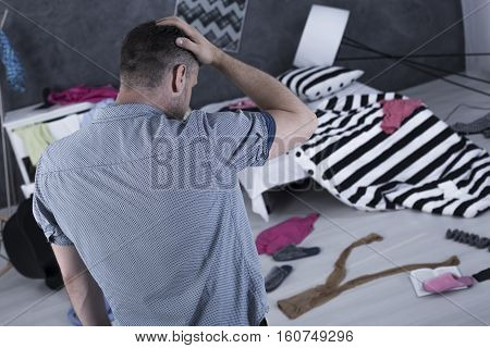 Sad Man In Messy Room