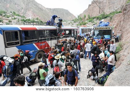 Iruya Argentina - 25 January 2011: backpacker tourists coming by bus at Iruya on the Argentina andes
