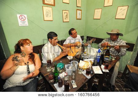 Salta Argentina - 21 February 2011 People listening at a music entertainment at the bar of La Casona on Salta Argentina