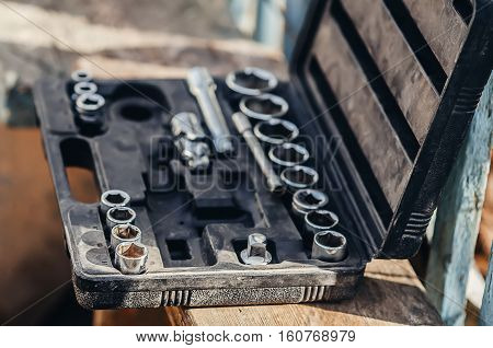 on the bench lies the suitcase head ratchet