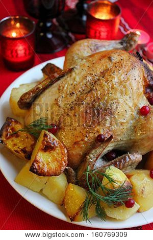 Thanksgiving dinner, Thanksgiving turkey. Served table. Thanksgiving table served with turkey, decorated with bright autumn leaves. Roasted turkey, table setting