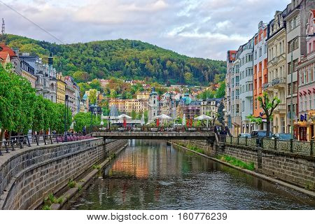 Tepla River And Saint Mary Magdalene Church In Karlovy Vary
