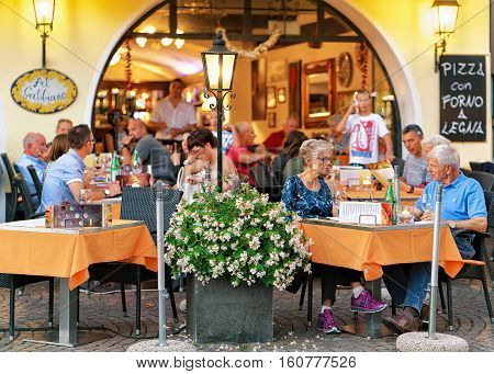 People Eating At Street Restaurant In Ascona In Swiss