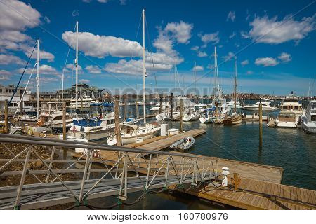 Pier Of Long Wharf And Sailboats