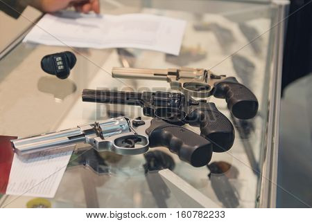 Revolvers on the counter in the gun shop. Weapon