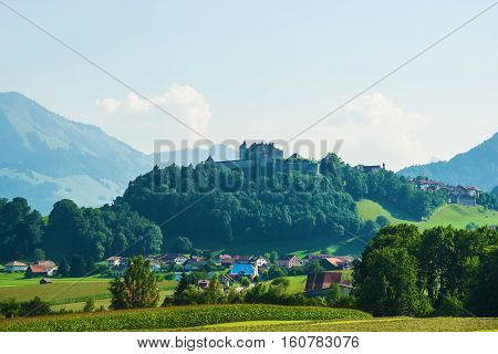 Gruyeres Castle And Prealps Mountains In Canton Fribourg In Switzerland