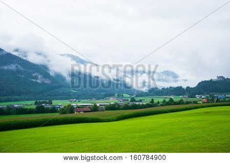 Village And Gruyeres Castle On Prealps Mountains In Fribourg Switzerland