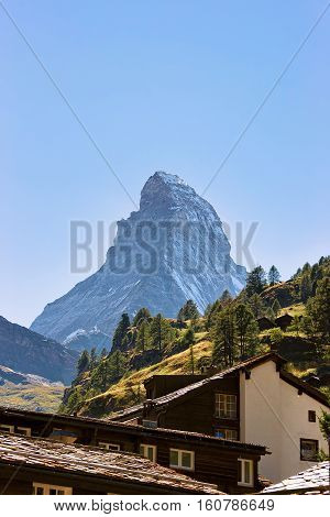 Roof Tops Of Chalets Of Zermatt With Matterhorn Mountain Swiss