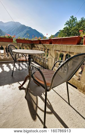 Table With Chairs On The Open Balcony Veranda Swiss