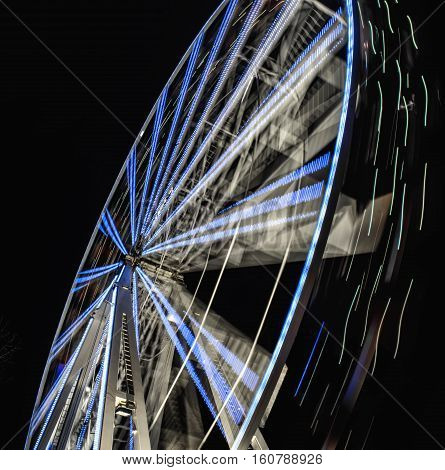 Big wheel all lit up at night