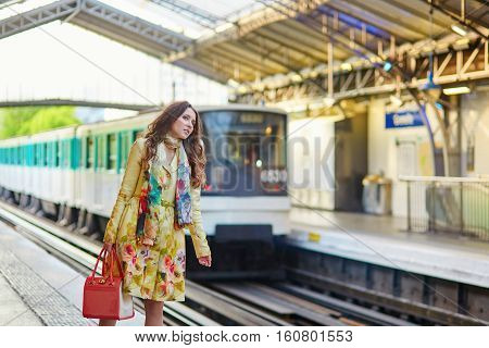 Young Beautiful Parisian Woman In Subway
