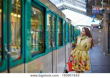 Young Beautiful Parisian Woman In Subway