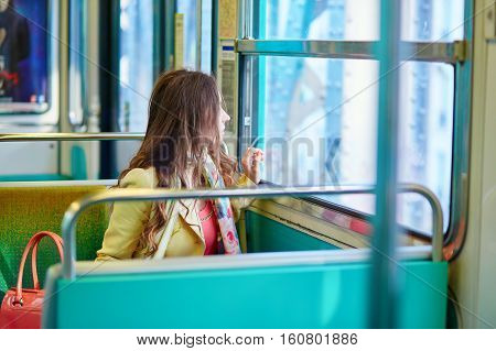 Beautiful Young Woman Travelling In A Train