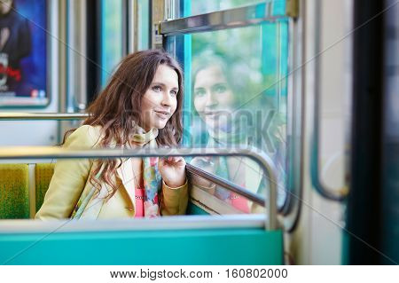 Young Beautiful Parisian Woman In Subway