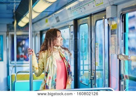 Beautiful Young Woman Travelling In A Train