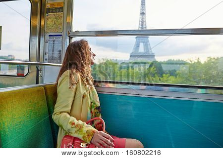 Woman Travelling In A Train Of Parisian Underground