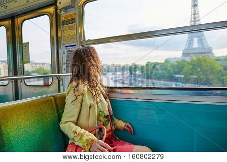 Beautiful Young Woman Travelling In A Train Of Parisian Underground