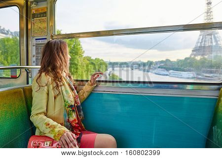 Woman Travelling In A Train Of Parisian Underground