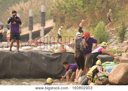 CHIANG RAITHAILAND-APR 32016 : Lifeguard and Triathlon athlete sporter in Golden Triangle Triathlon on April 3 2016 in Chiang sean district Chiang raiThailand.