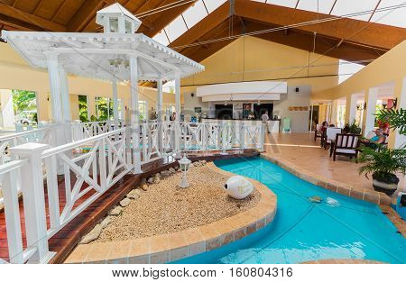 Cayo Coco island, Memories Carib resort, Cuba, June 26, 2016, amazing beautiful view of stylish interior hotel lobby with people in background