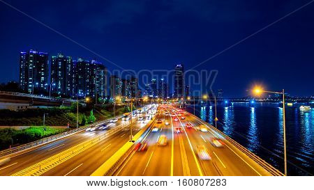 Beautyful of traffic in Seoul at night and cityscape South Korea with motion blur.