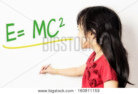 Little Chinese girl is learning science formular