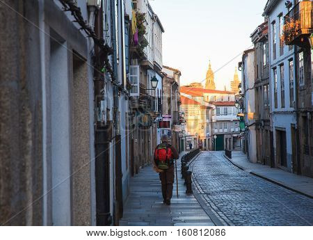 SANTIAGO SPAIN - AUGUST 17: Pilgrimn go to the Santiago cathedral on August 17 2016