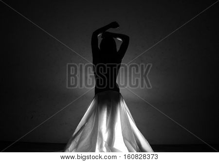 Female nude body in a dark - attractive beauty body