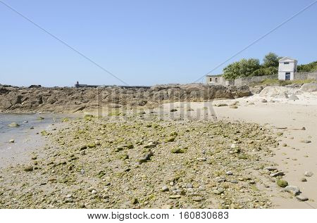 Stones at the shore of beach in Corrubedo Galicia Spain
