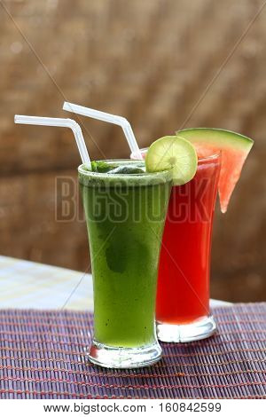 Lemon mint and Watermelon smoothie on table.