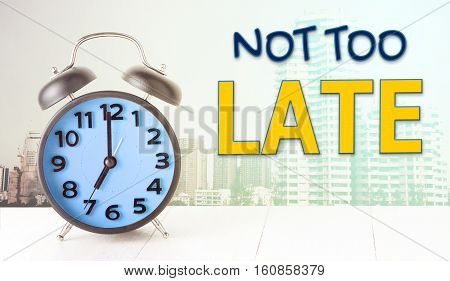 Alarm Clock in the city Not too late concept.