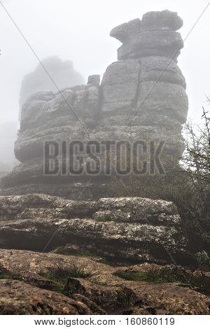 El Torcal De Antequera in the fog Malaga Spain. Unusual stunning rock formation