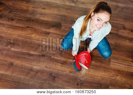 Cleaning Woman Sweeping Wooden Floor