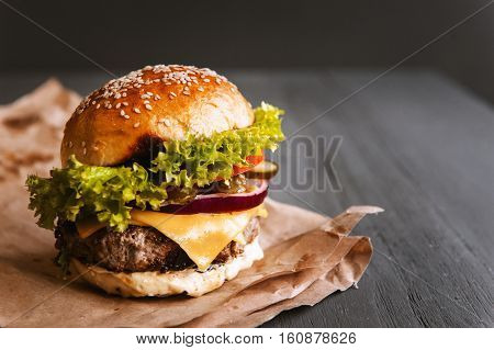 Delicious Fresh Homemade Burger On A Wooden Table