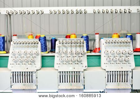 Garment factory. The equipment for an embroidery on fabric.