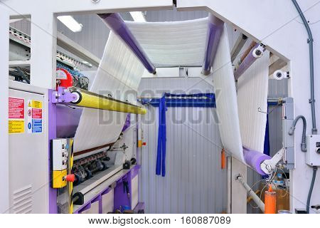 sewing equipment loom. Equipment at a garment factory