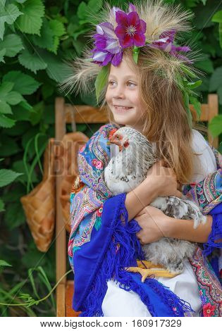 girl, young, cock, hand wreath green plant scarf outfit village