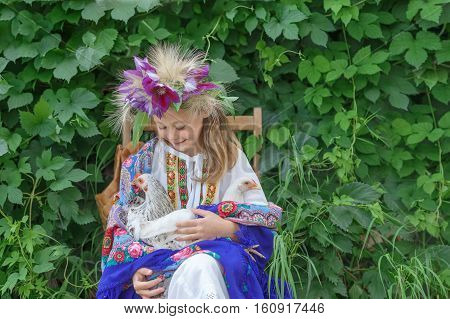 girl, young, cock, hand wreath green plant scarf outfit village
