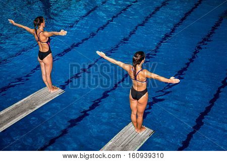 Two female divers on training or on competition.