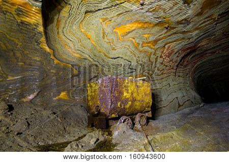 Abandoned varicoloured salt mine shaft tunnel carnallite