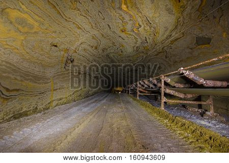 Abandoned varicoloured salt mine shaft tunnel carnallite