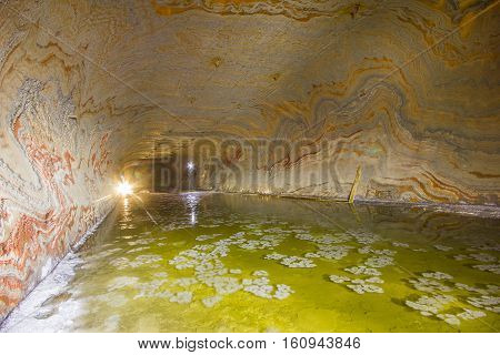 Abandoned varicoloured salt mine shaft tunnel carnallite